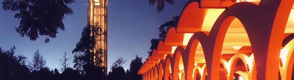 bell tower and Rivera library at night