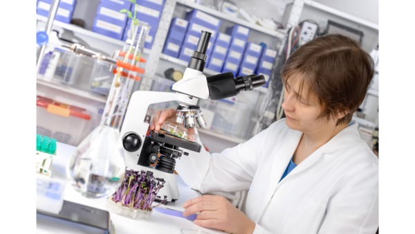 lab with microscope and researcher .png 